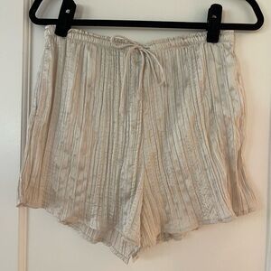 H&M champagne satin-like shorts with pockets and adjustable drawstring - size M